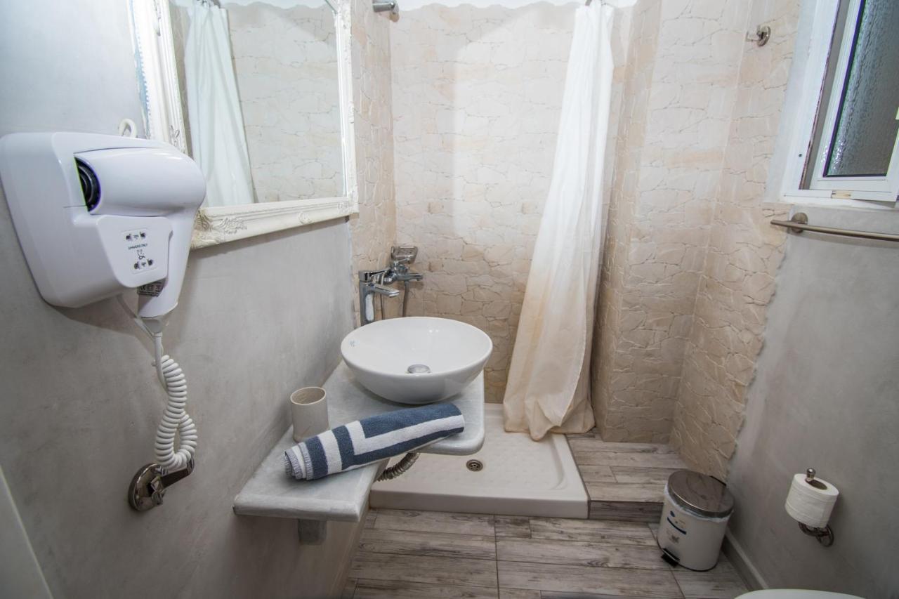 Alexandros Aparthotel Poros Town Quarto foto